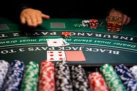 Roulette wheel spinning with betting board visible on Evolution Gaming table